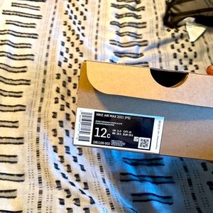 Nike Air Max Size is a 12c Brand New never been worn.